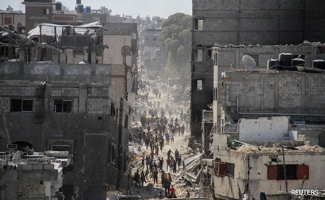 A luta em Gaza diminui enquanto Israel declara 'pausa' para facilitar o fluxo de ajuda