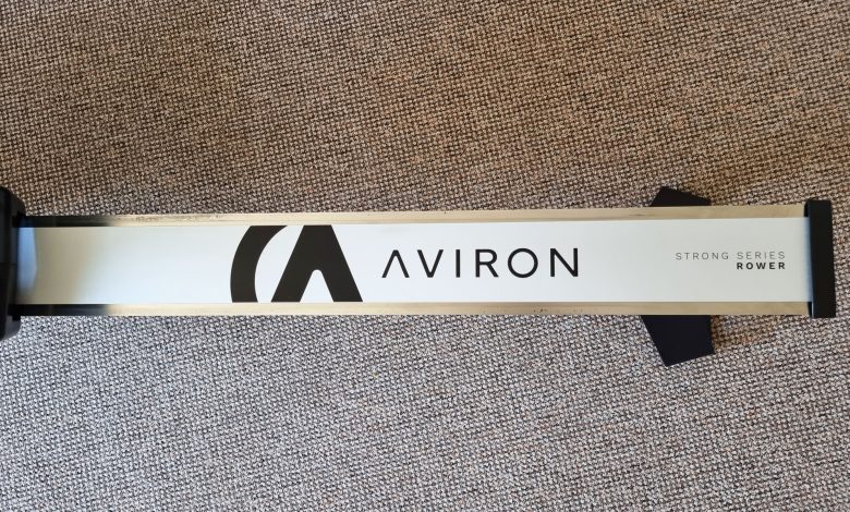 The Aviron Strong Series Rower, a close-up photo of the railing